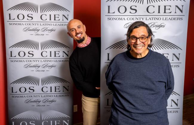 Herman J. Hernandez, right, founded the Latino leaders group Los Cien and has now passed on the leadership to his son, Herman G. Photo taken in their Santa Rosa office, Wednesday, June 15, 2023. (John Burgess / The Press Democrat)
